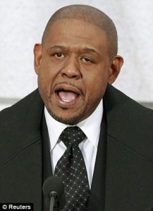Actor Forest Whitaker (left) and golfer Tiger Woods also took the podium